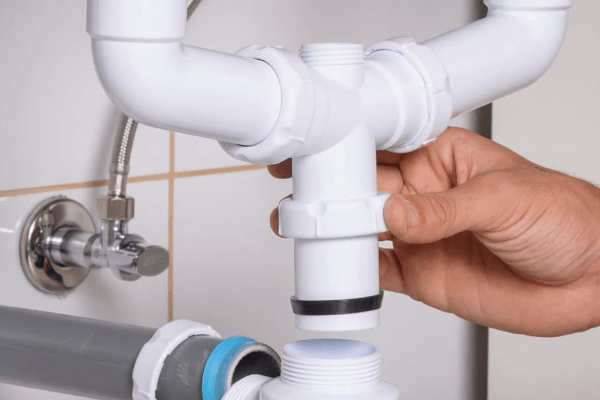 Cómo solucionar el rebose del fregadero doble